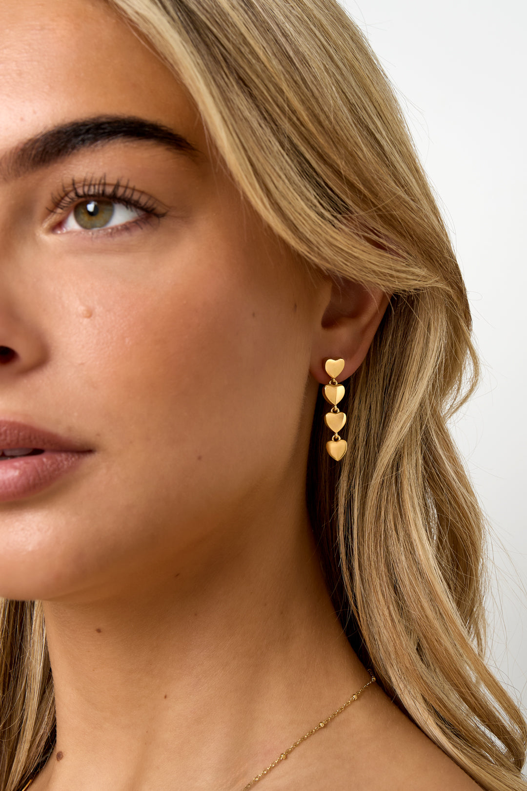 Four Small heart earrings